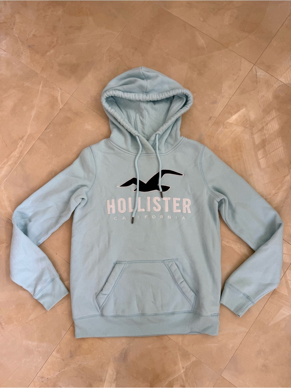 light blue Hollister logo graphic hoodie